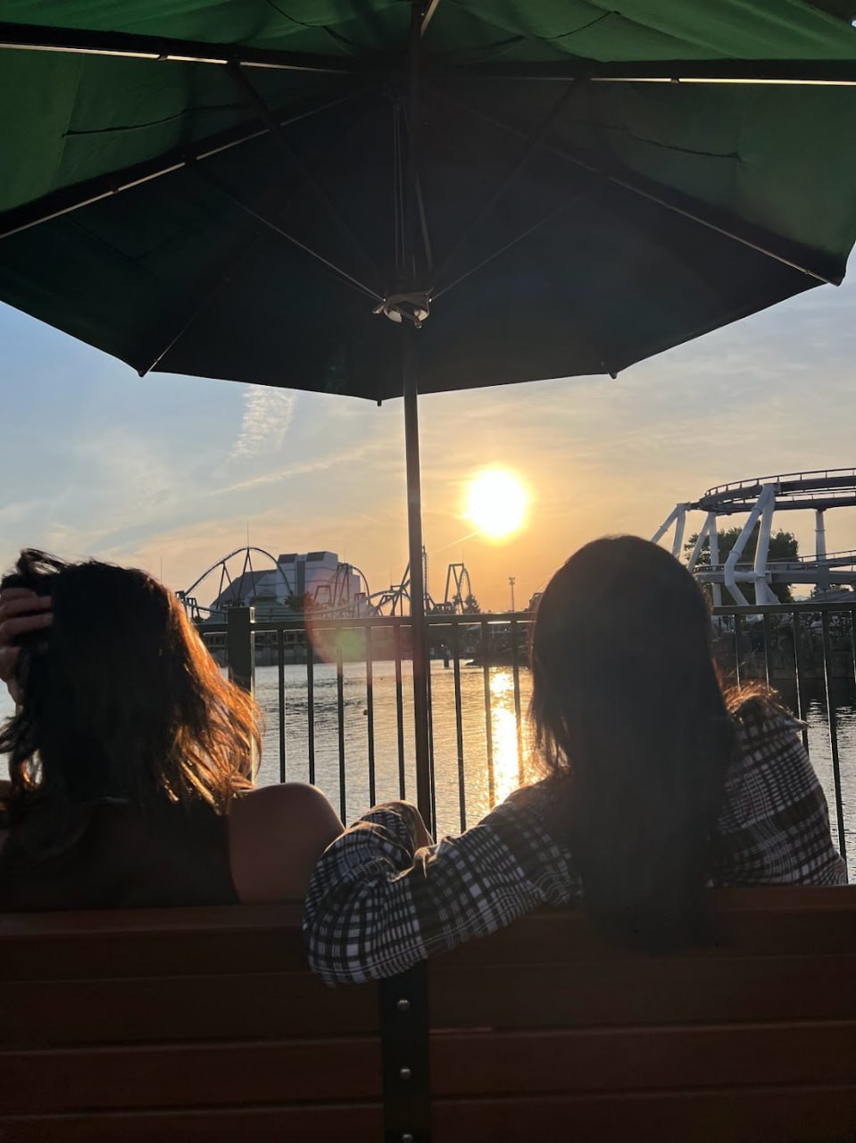 Sunset silhouette watching rollercoasters at USJ